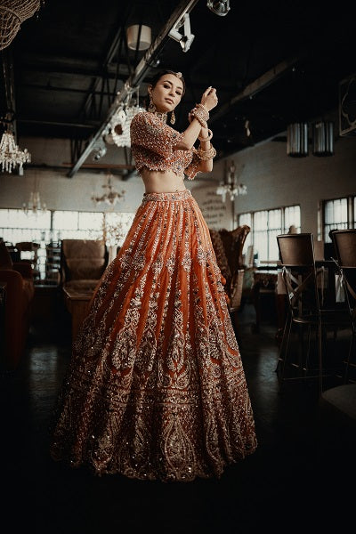 Zahra tiger orange and sage zardozi bridal lehenga by WellGroomed