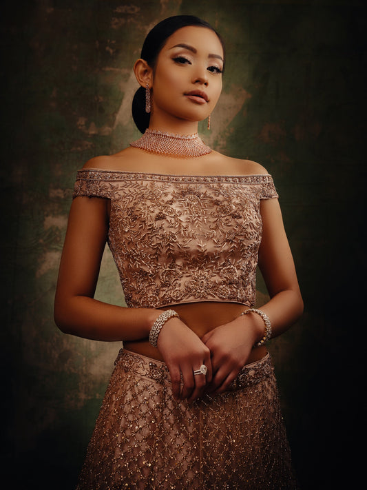 Aarya dusty rose off-shoulder reception lehenga by WellGroomed