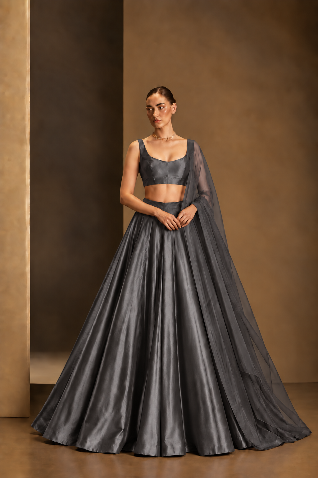 Charcoal Grey plain lehenga with sleeveless choli and matching sheer dupatta