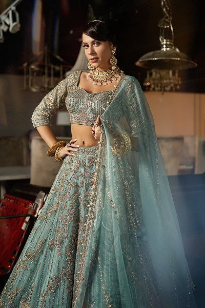 Mira sky blue Zardozi reception lehenga by WellGroomed